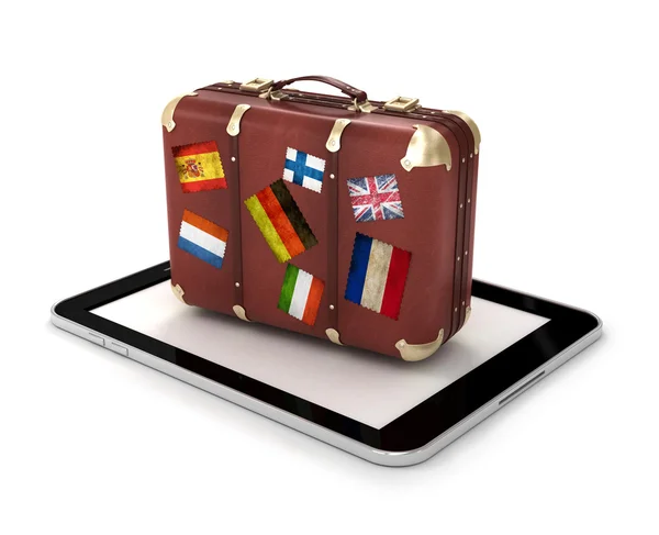 Utazási koncepció tabletta és bőrönd — Stock Fotó
