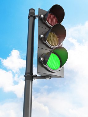 mavi gökyüzünün önünde üç ışıklar yanıyor