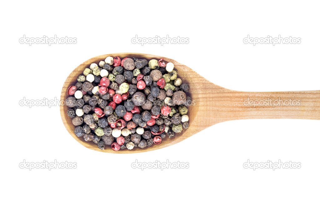 color pepper in wooden spoon