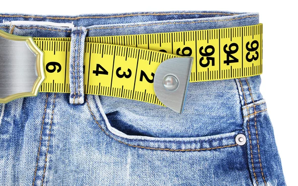 Jeans with measuring tape — Stock Photo, Image