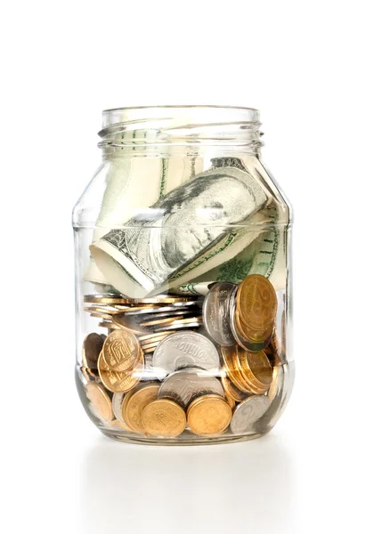 Glass bank for tips with money — Stock Photo, Image