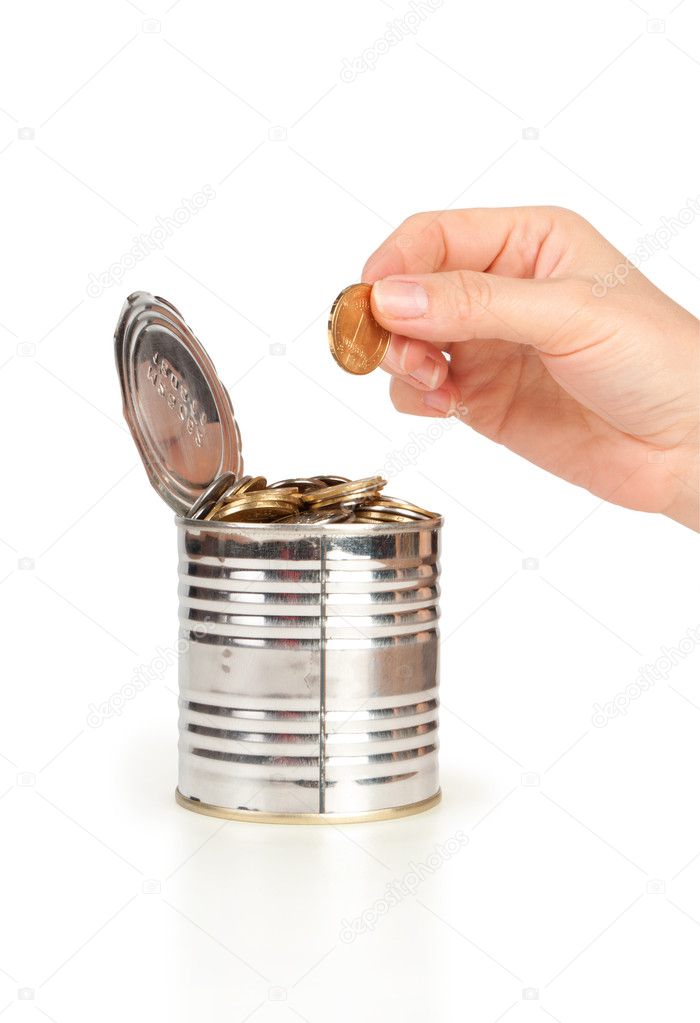 Nad putting money in metal tin