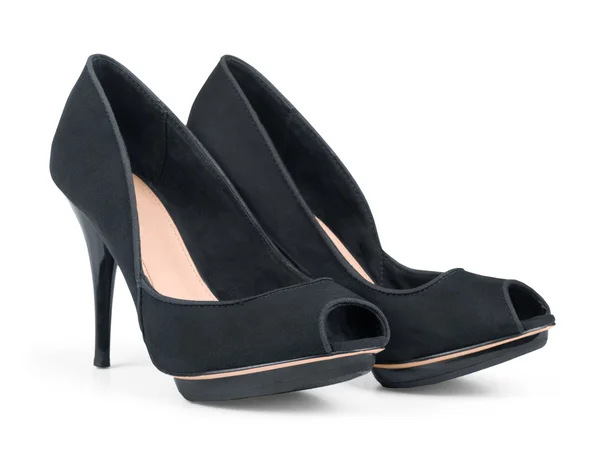 Kadın siyah bir topuk ayakkabılarıyla — Stok fotoğraf