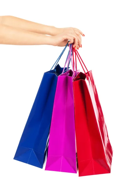 Bolsas de compras en la mano de mujer — Foto de Stock