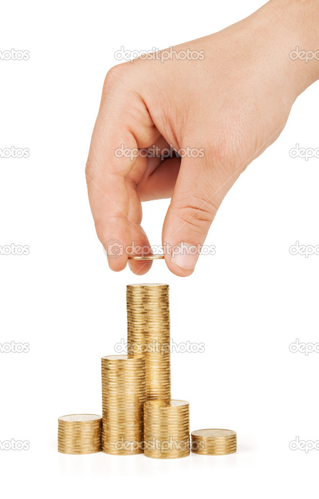Hand put coins to stack of coins