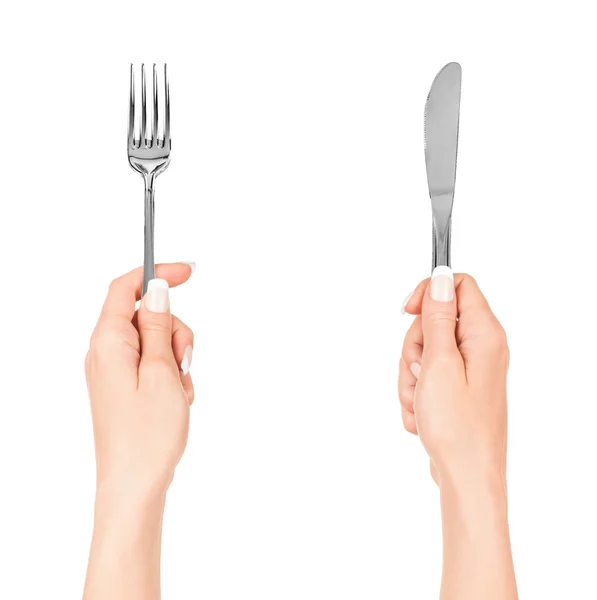 Mão segurando garfo e faca — Fotografia de Stock