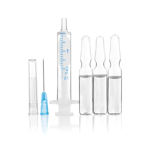 Medical ampoules and syringe isolated on white background — Stock Photo, Image