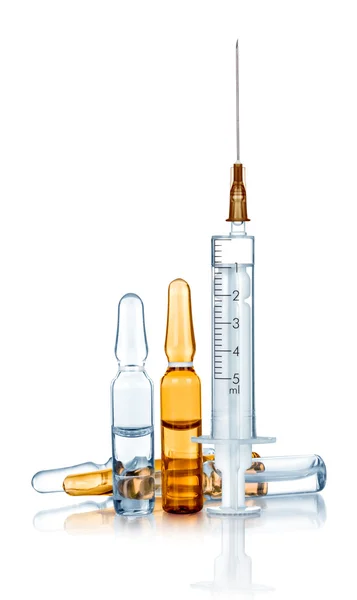 Syringe and ampoules on an isolated white background — Stock Photo, Image