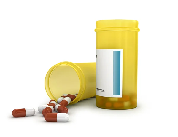 Flaconi di medicinali prescritti. Uno chiuso e uno aperto con pillole che fuoriescono su sfondo bianco . — Foto Stock