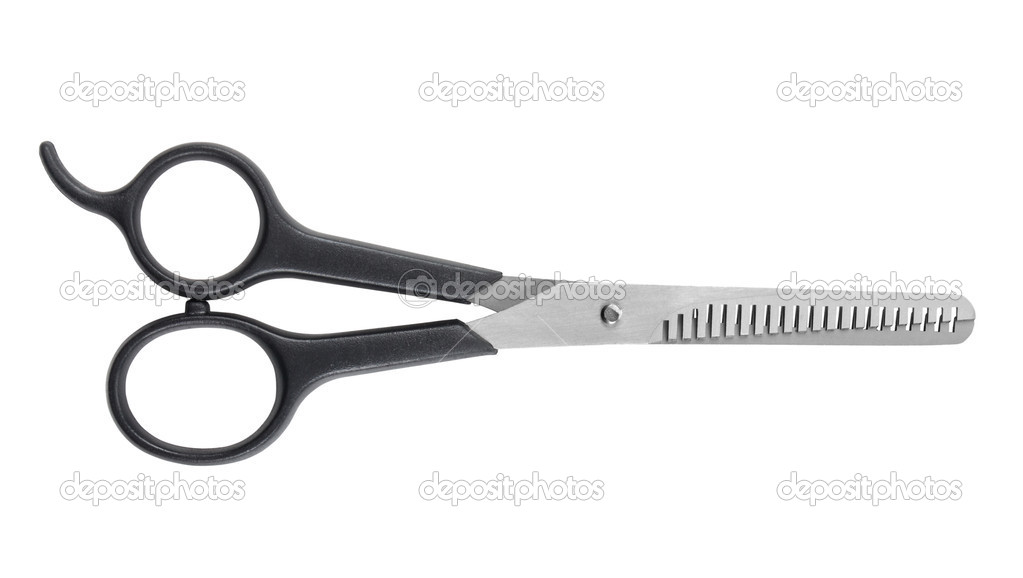 Hairdressing scissors on an isolated white background