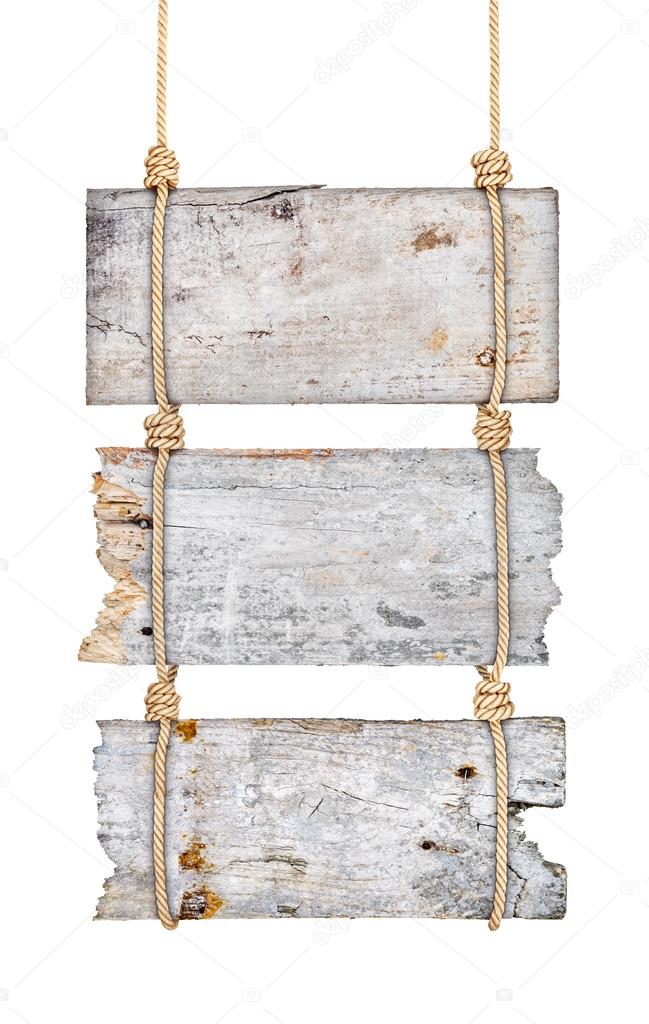 vintage wooden signs on the rope on an isolated white background