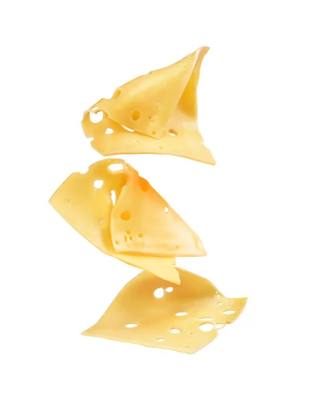 slices of cheese in flight on a white background