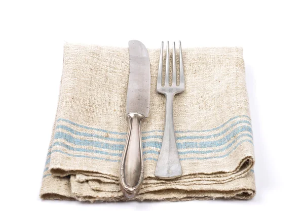 Ancient cutlery on linen — Stock Photo, Image