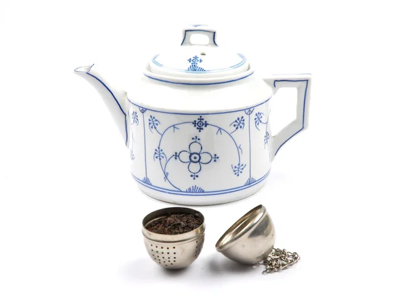 Teapot and tea ball — Stock Photo, Image