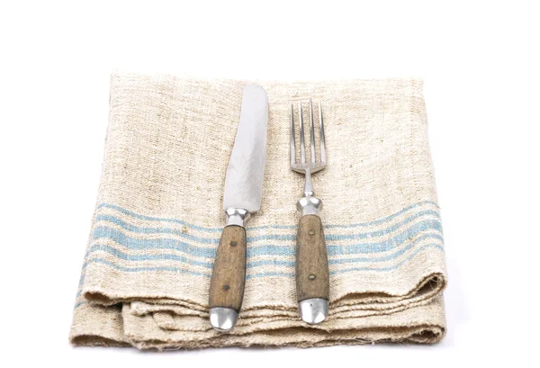 Ancient cutlery on linen — Stock Photo, Image