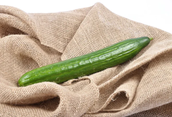 Cucumber on jute — Stock Photo, Image