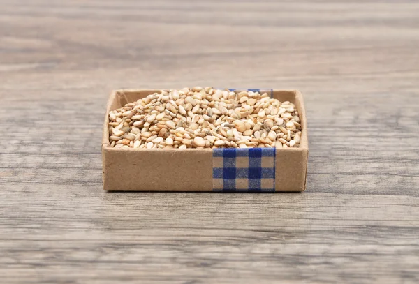 Sesame on wood — Stock Photo, Image