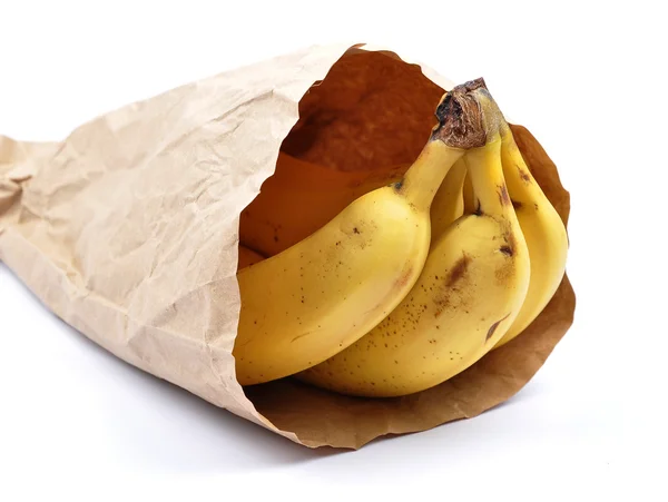 Банани в паперовій сумці — стокове фото