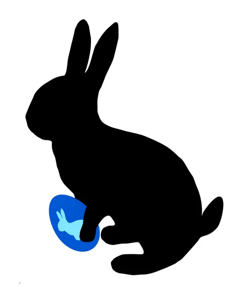 La silhouette nera di un coniglietto pasquale con uovo pasquale — Vettoriale Stock