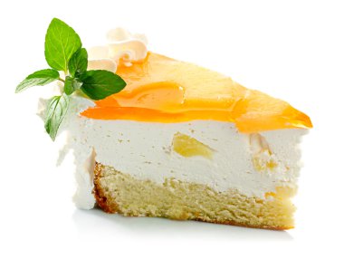 Piece of pineapple cake cream and mint leaves isolated