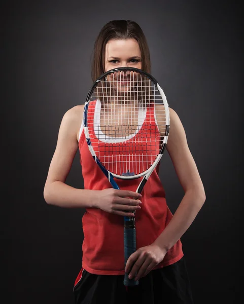 Portrait of sporty girl tennis player with racket — Stock Photo, Image