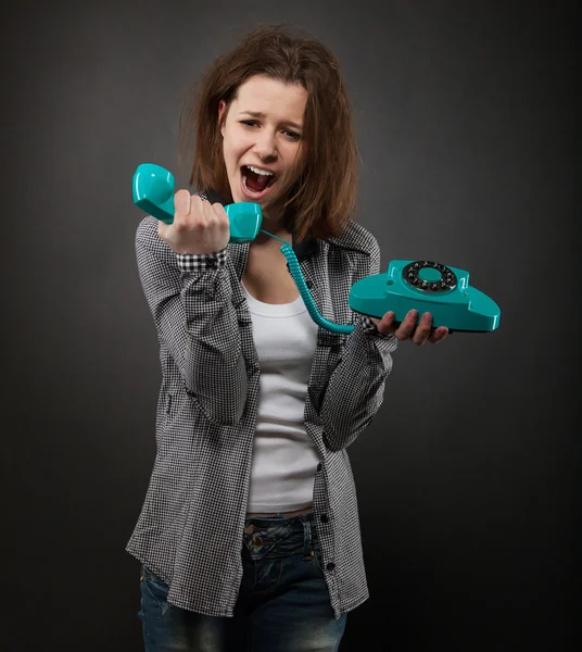 Portrait of the funny girl with old phone — Stock Photo, Image