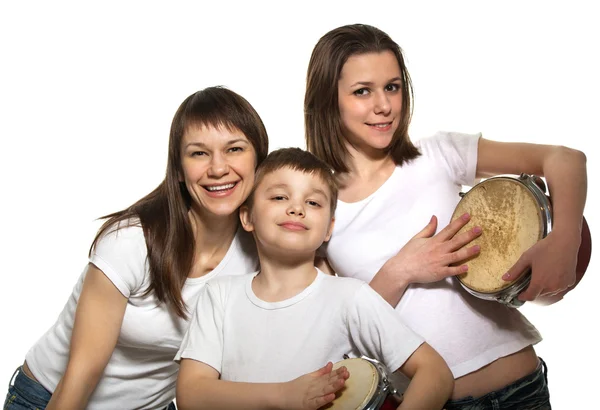Familia feliz con tambores — Foto de Stock