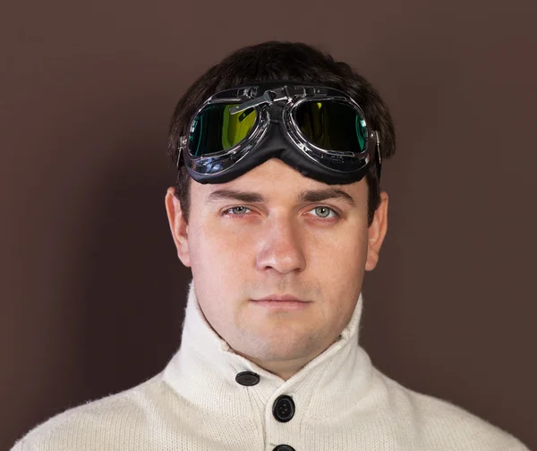 Young man wearing old-fashioned pilot glasses — Stock Photo, Image