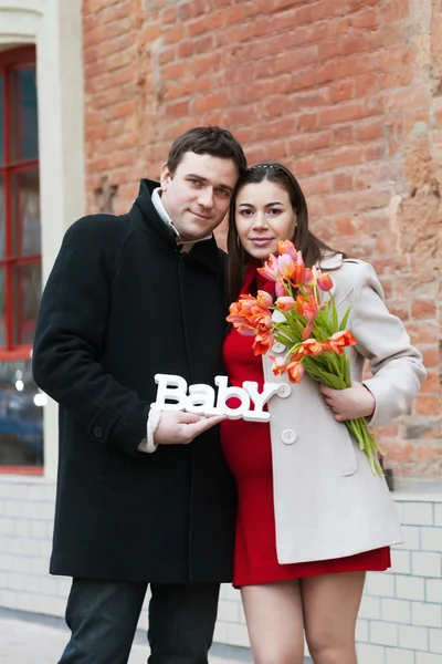 Pregnant woman with her husband — Stock Photo, Image