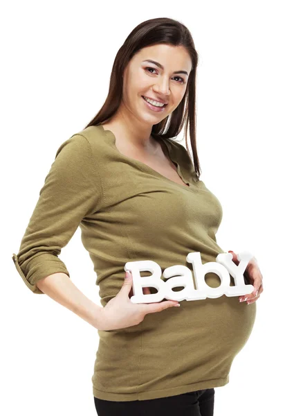 Счастливая беременная женщина — стоковое фото