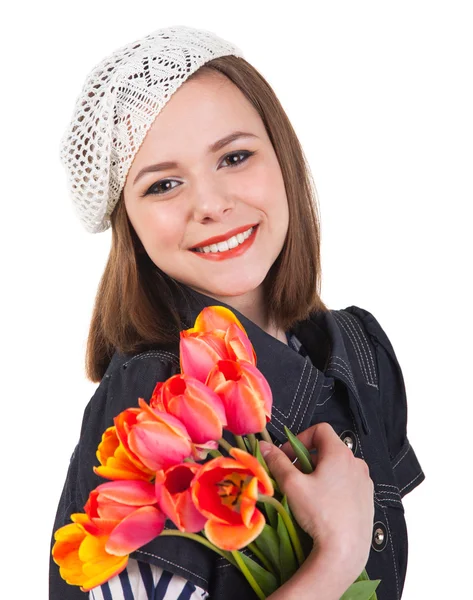 Cute brunette girl with tulip flowers — Stock Photo, Image