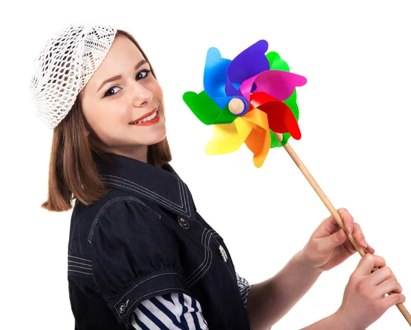 年轻可爱的黑发女孩用风力涡轮机玩具 — 图库照片