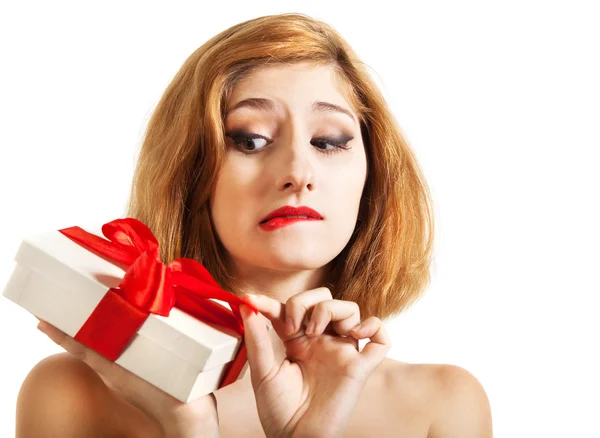 Beautiful young brunette girl with present — Stok fotoğraf