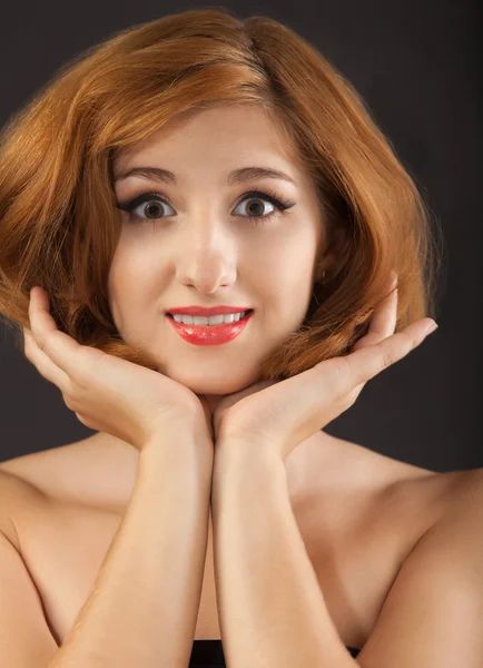 Beautiful young woman with red hair — Stock Photo, Image