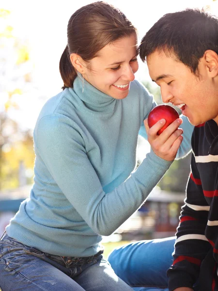 Happy young couple in love outdoors — Stock Photo, Image