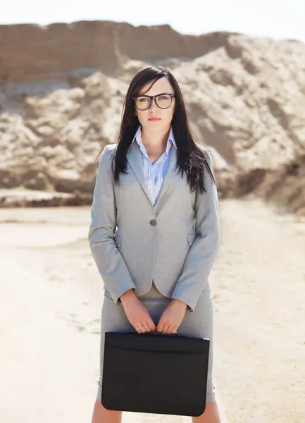 Happy businesswoman jumping in the air — Stock Photo, Image