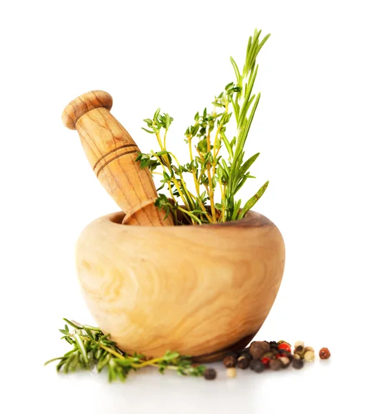 Mortar with fresh herbs — Stock Photo, Image