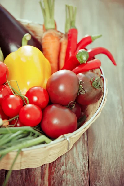 Vegetables still life on wooden background — Stock Photo, Image