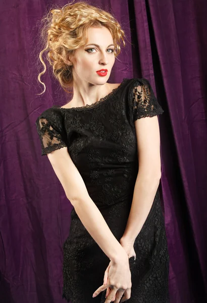 Glamour woman wearing black lace dress — Stock Photo, Image