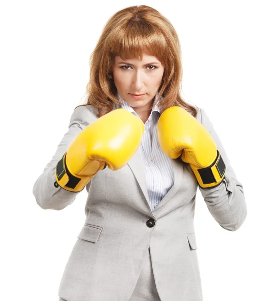 Businesswoman wearing boxing gloves — Stock Photo, Image