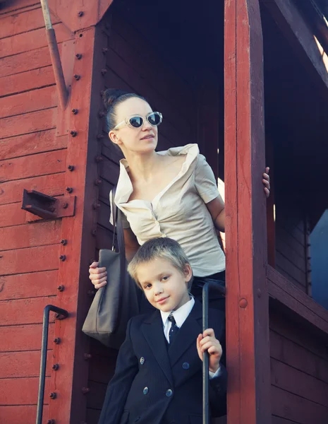 Woman with her son in the retro train — Stock Photo, Image