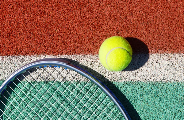 Close up of tennis racquet and ball — Stock Photo, Image