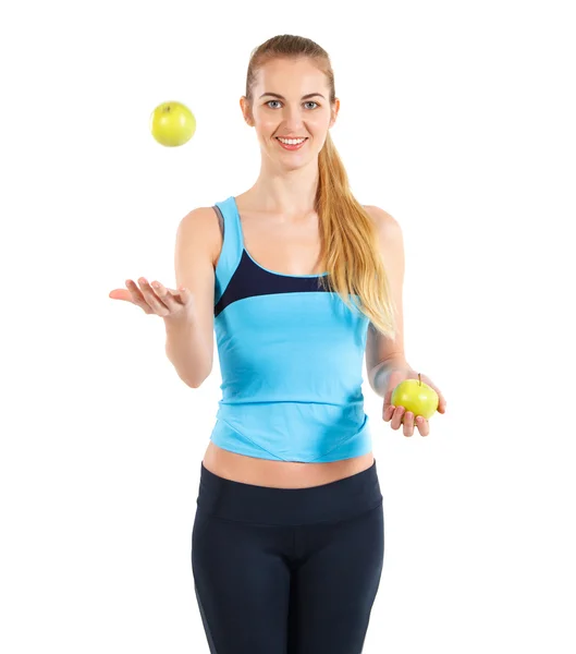 Yeşil elma tutan gülümseyerek mutlu kadın fitness — Stok fotoğraf