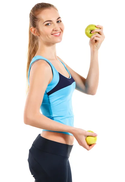 Yeşil elma tutan gülümseyerek mutlu kadın fitness — Stok fotoğraf