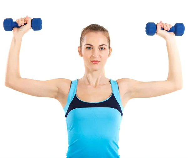 Sportos nő kék súlyzórúdhoz — Stock Fotó
