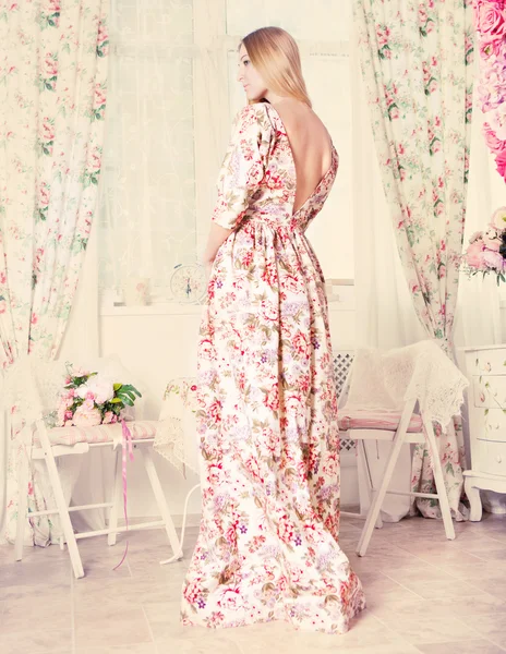 Portrait of the beautiful blond girl in long dress — Stock Photo, Image