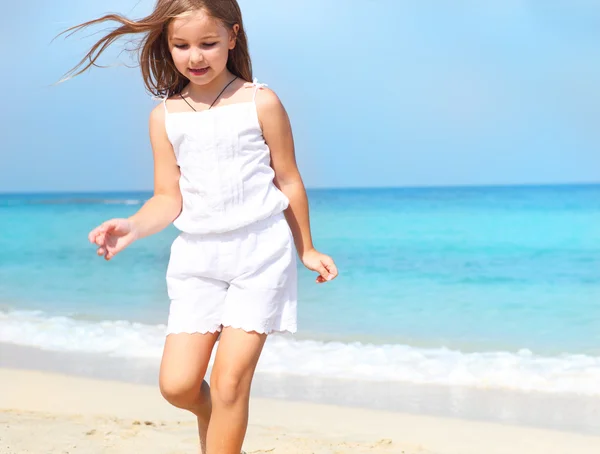 Cute little child girl on the beach — Stock Photo, Image