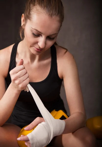 Woman boxer wearing white strap on wrist — Stock Photo, Image