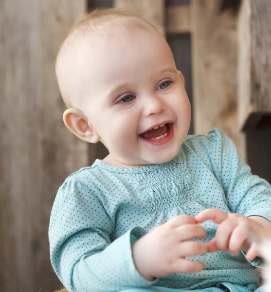 Cute smiling ten month old baby — Stok fotoğraf