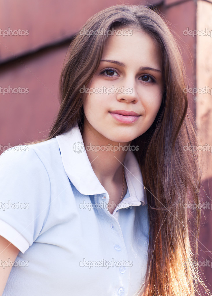 Portrait of a beautiful happy teen girl